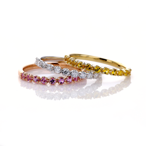 0.30ct pink sapphire band set in warm 14K rose gold
